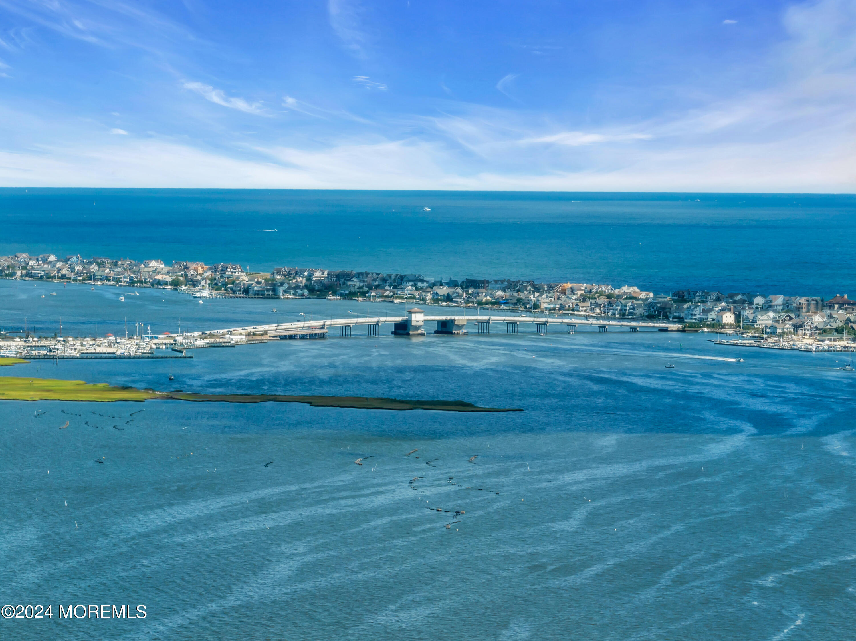 a view of an ocean and city