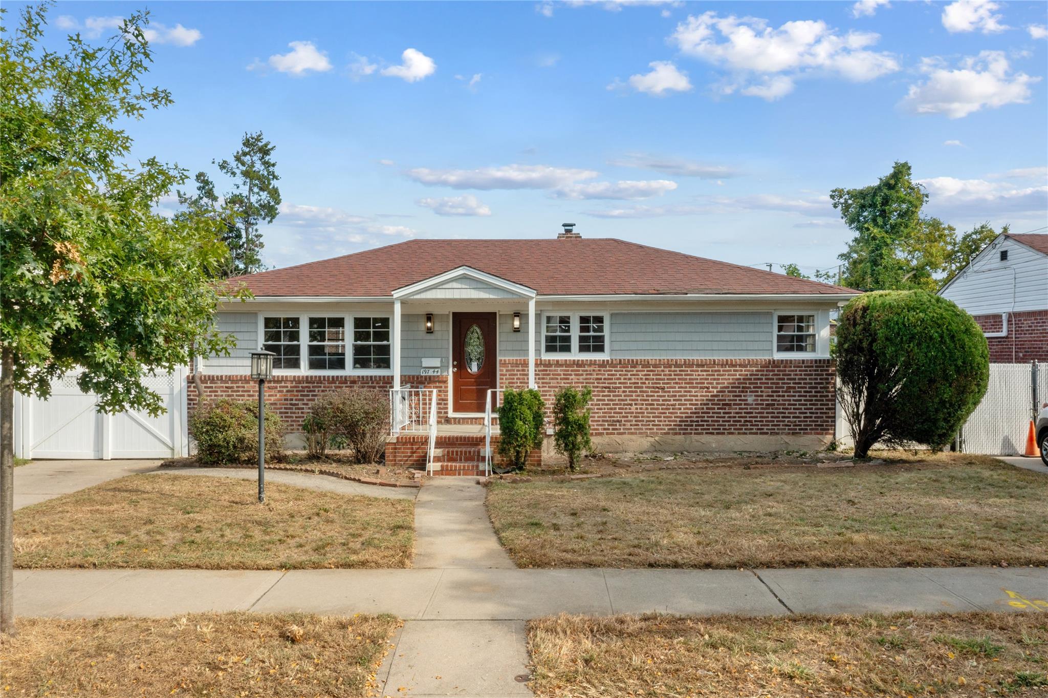 View of front of house with a front lawn