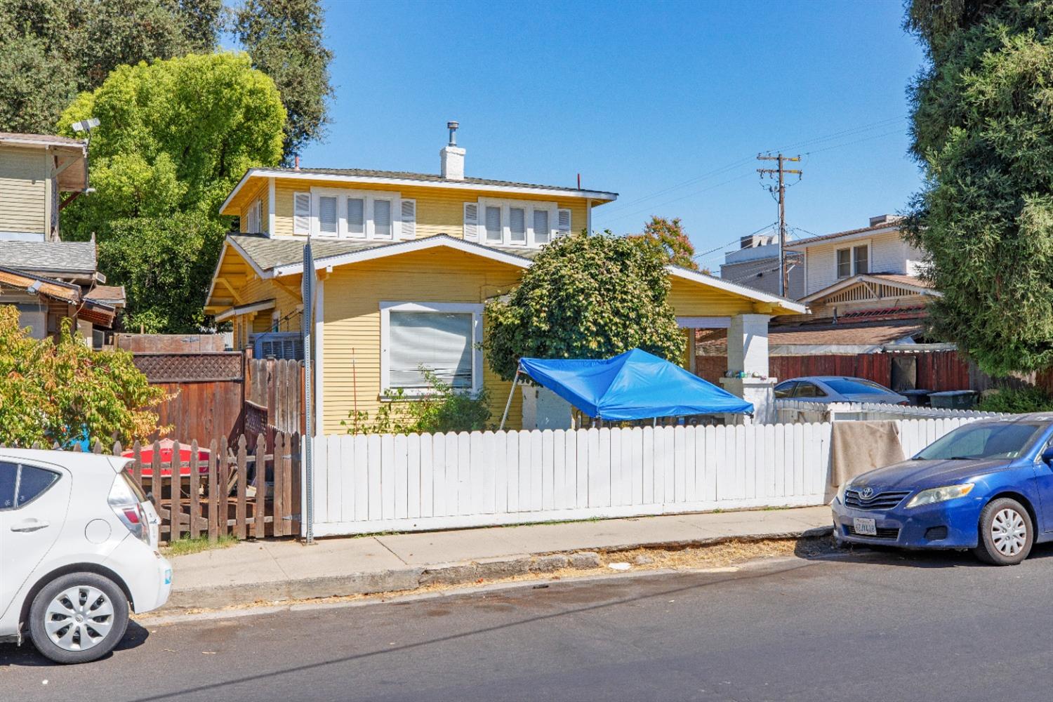 a car parked in front of a house