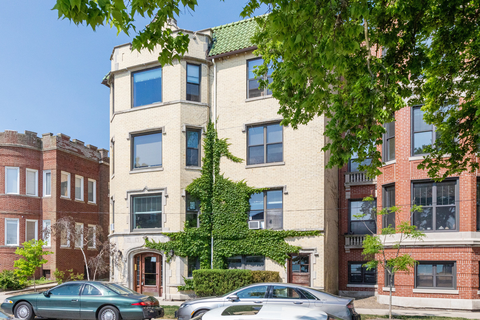 a front view of a building with street view