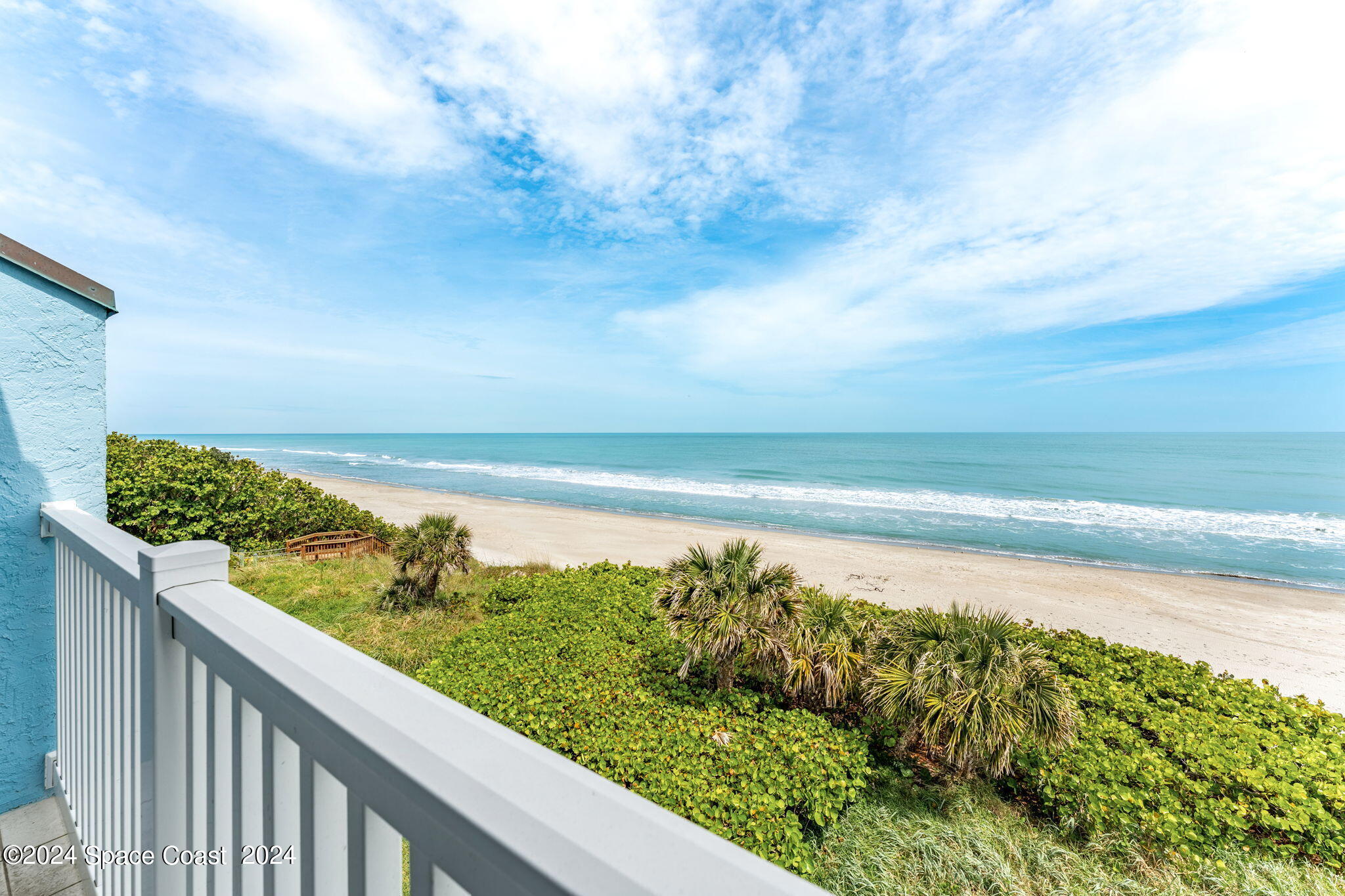 a view of ocean from a balcony