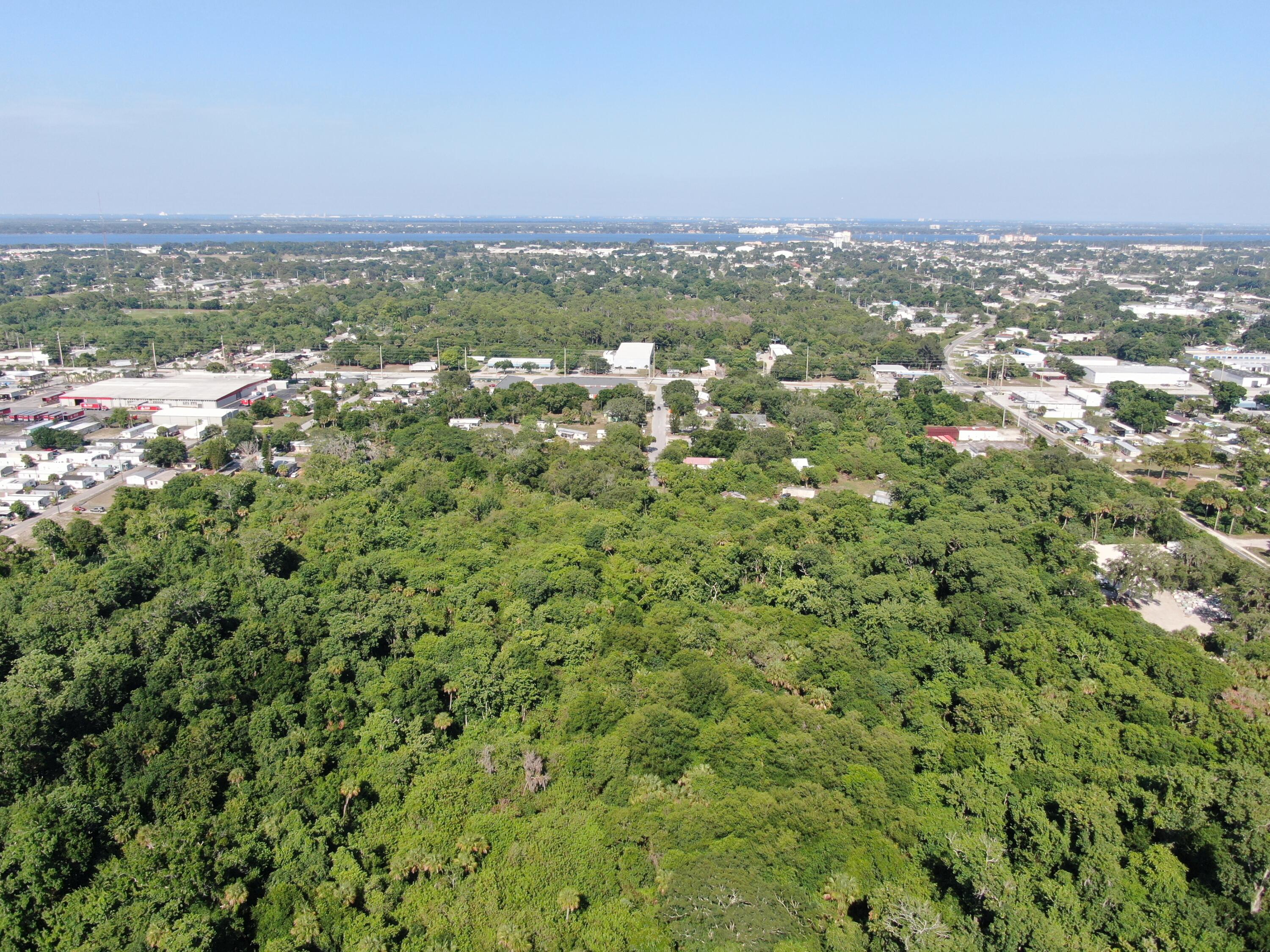 an aerial view of residential house with outdoor space