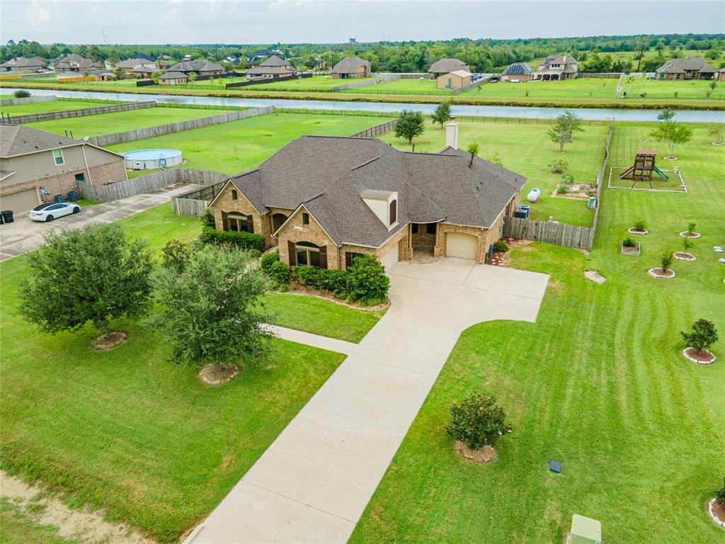 an aerial view of a house with a garden