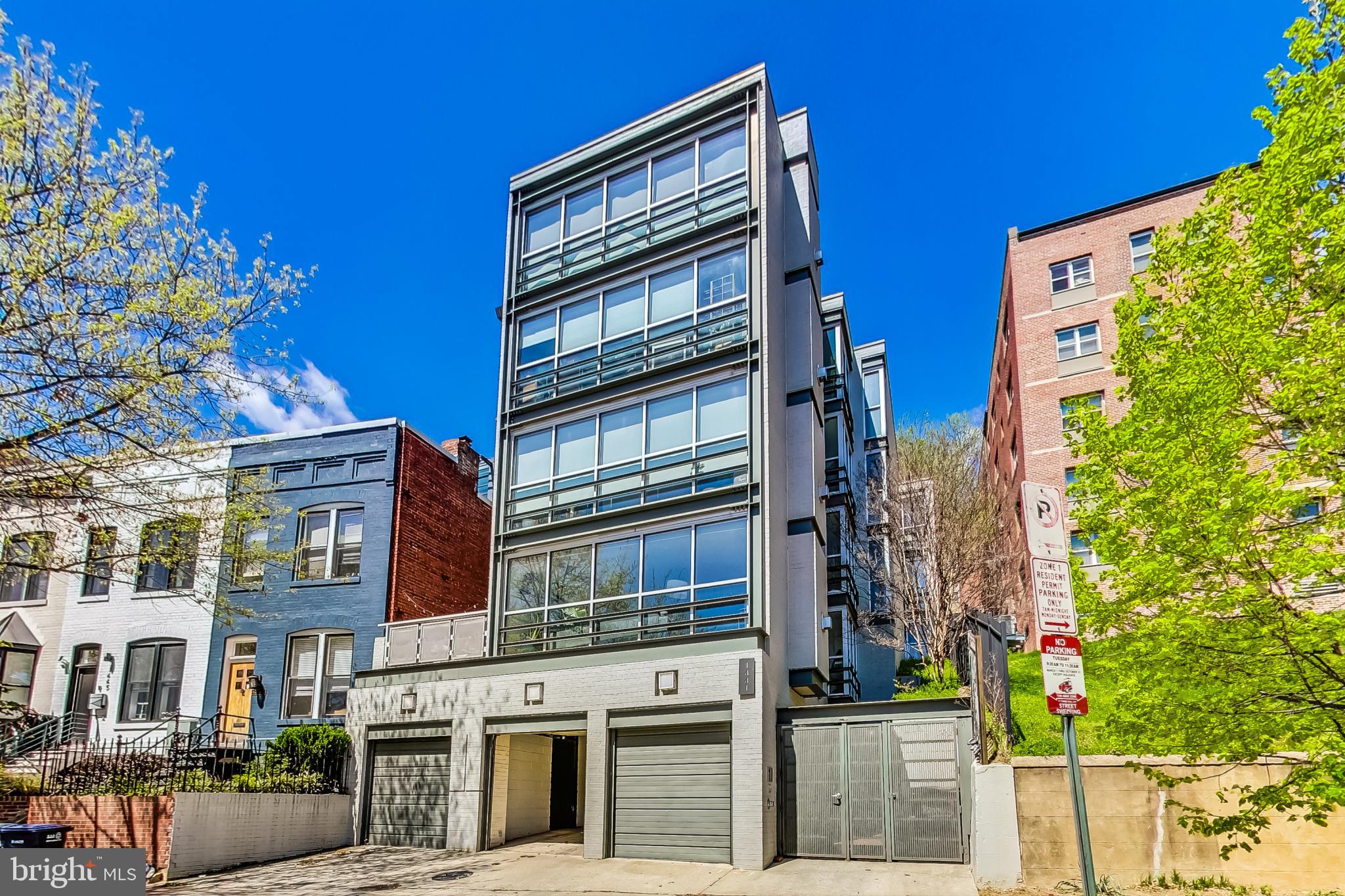 a front view of a building with street view