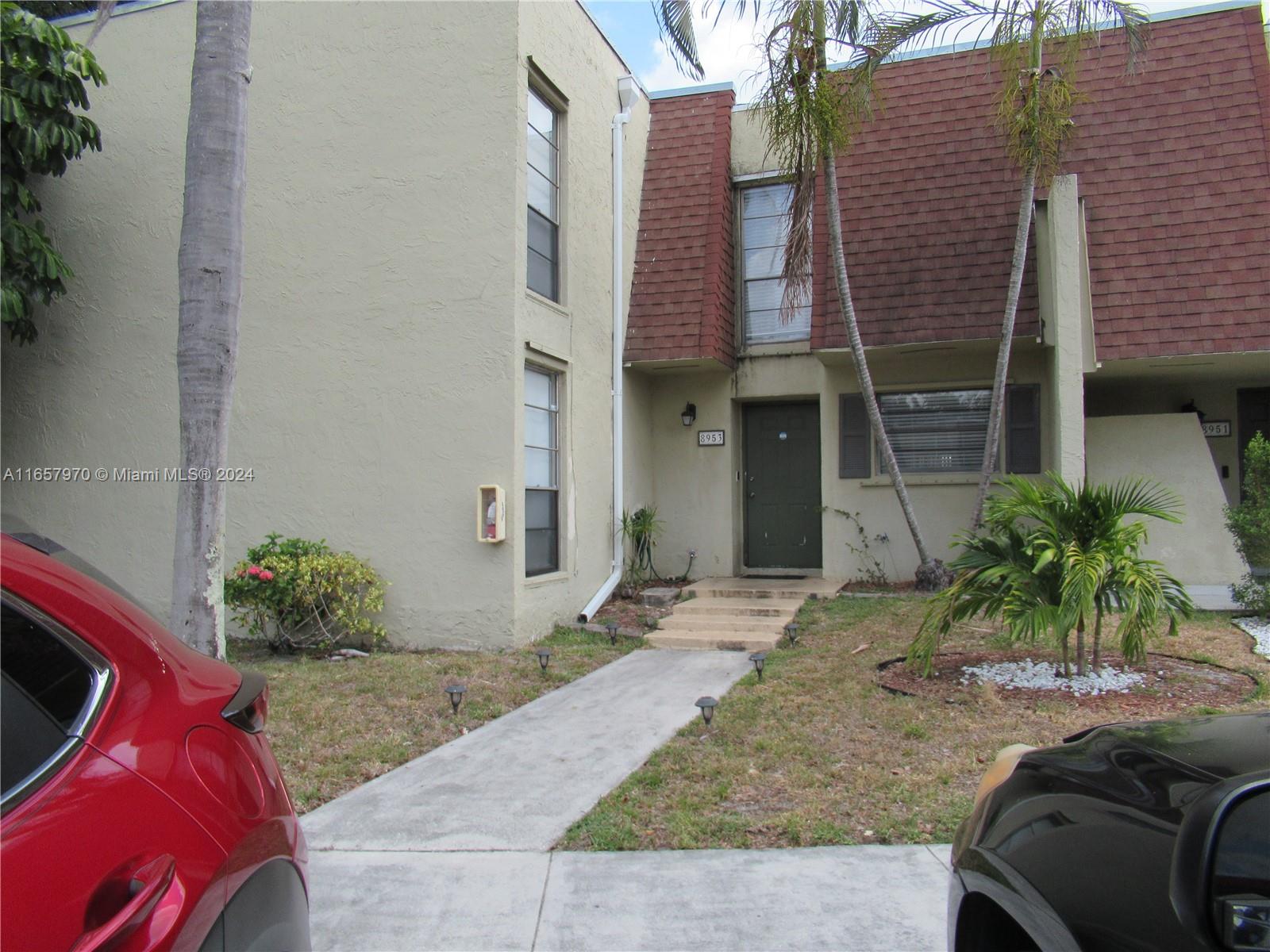 a view of backyard of a house