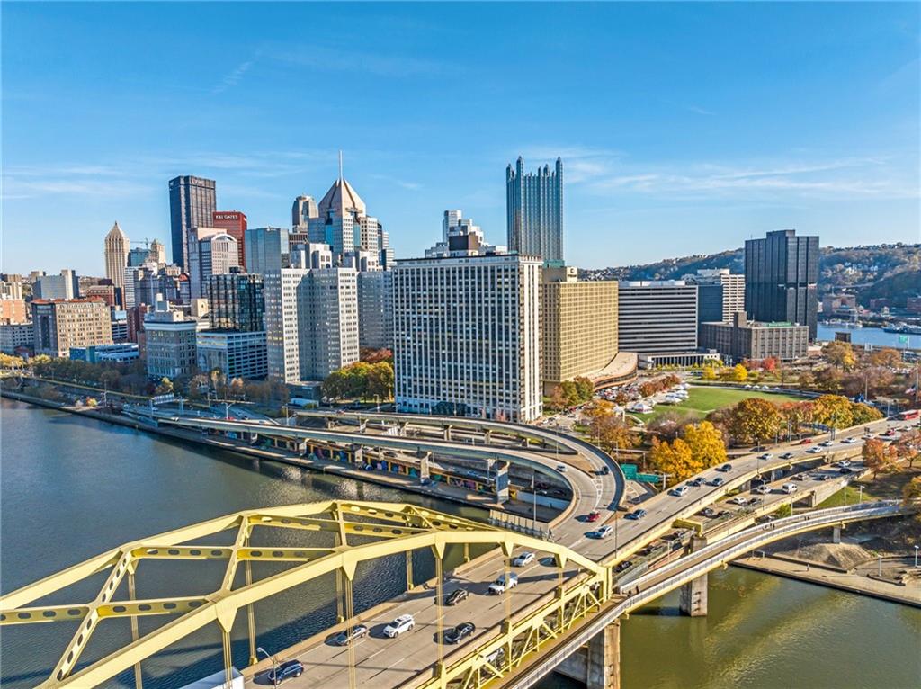 a view of a city with tall buildings