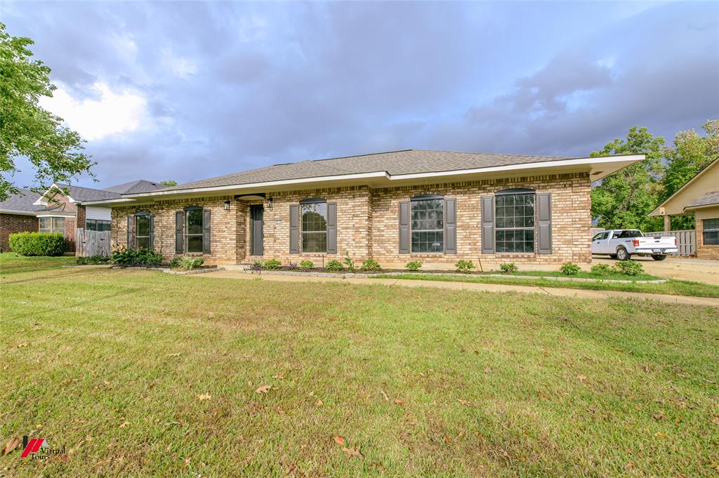 a front view of house with yard