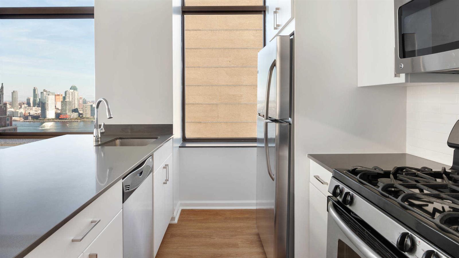 a kitchen with a stove and a refrigerator