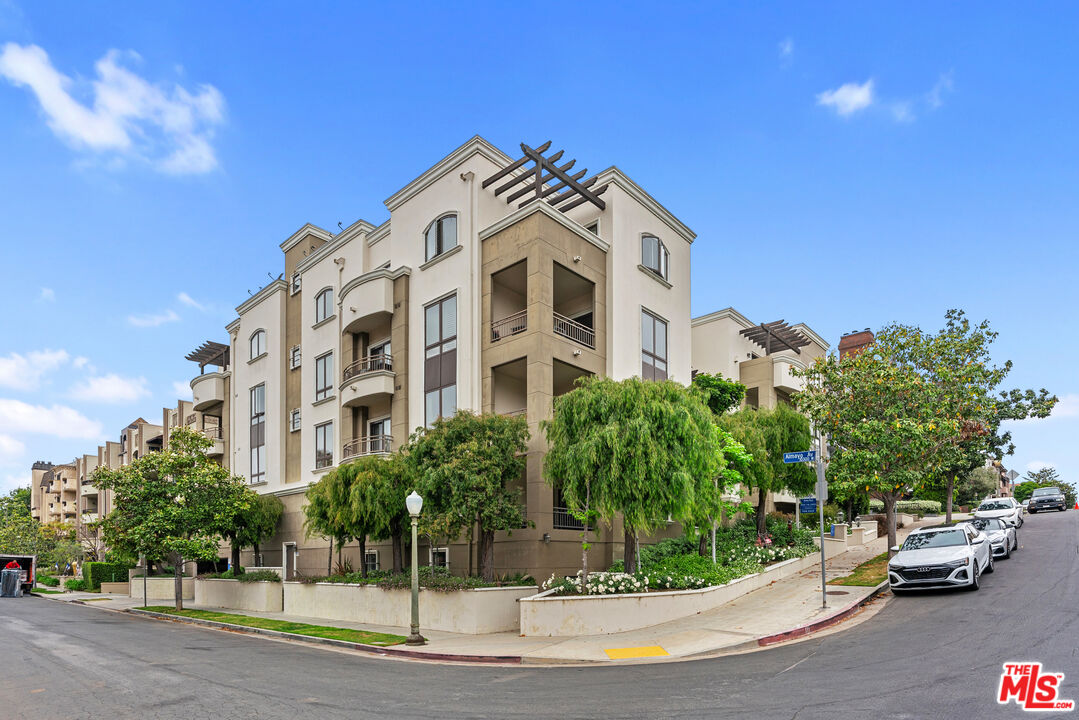 a view of a buildings with a street view