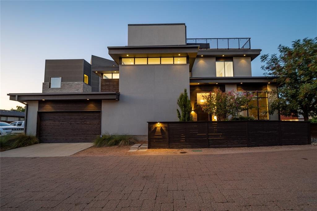 a front view of a house with yard