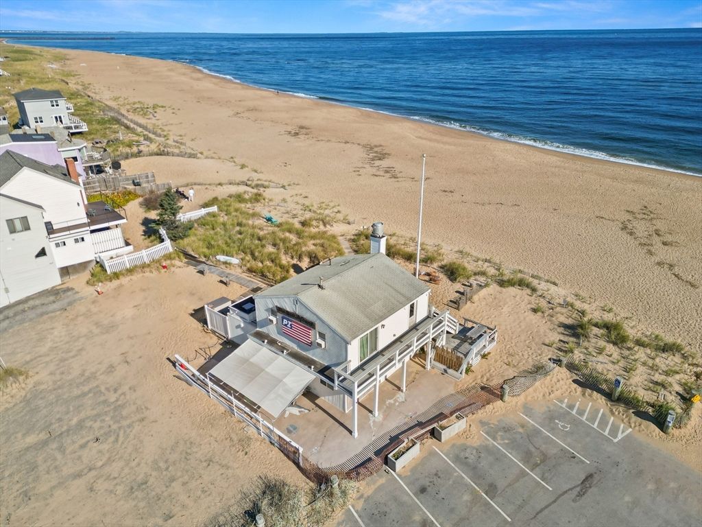 an aerial view of beach and ocean