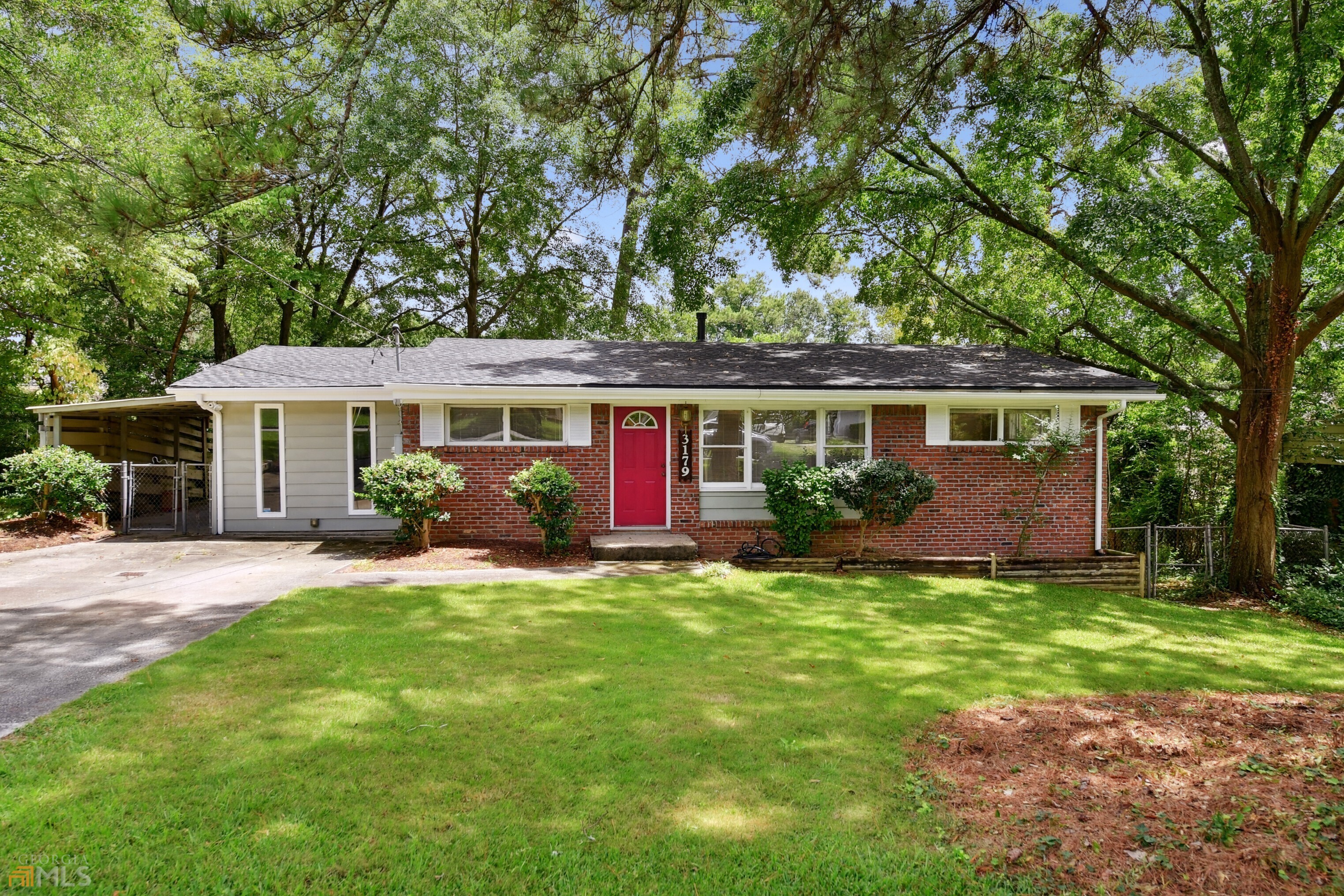 front view of a house with a big yard