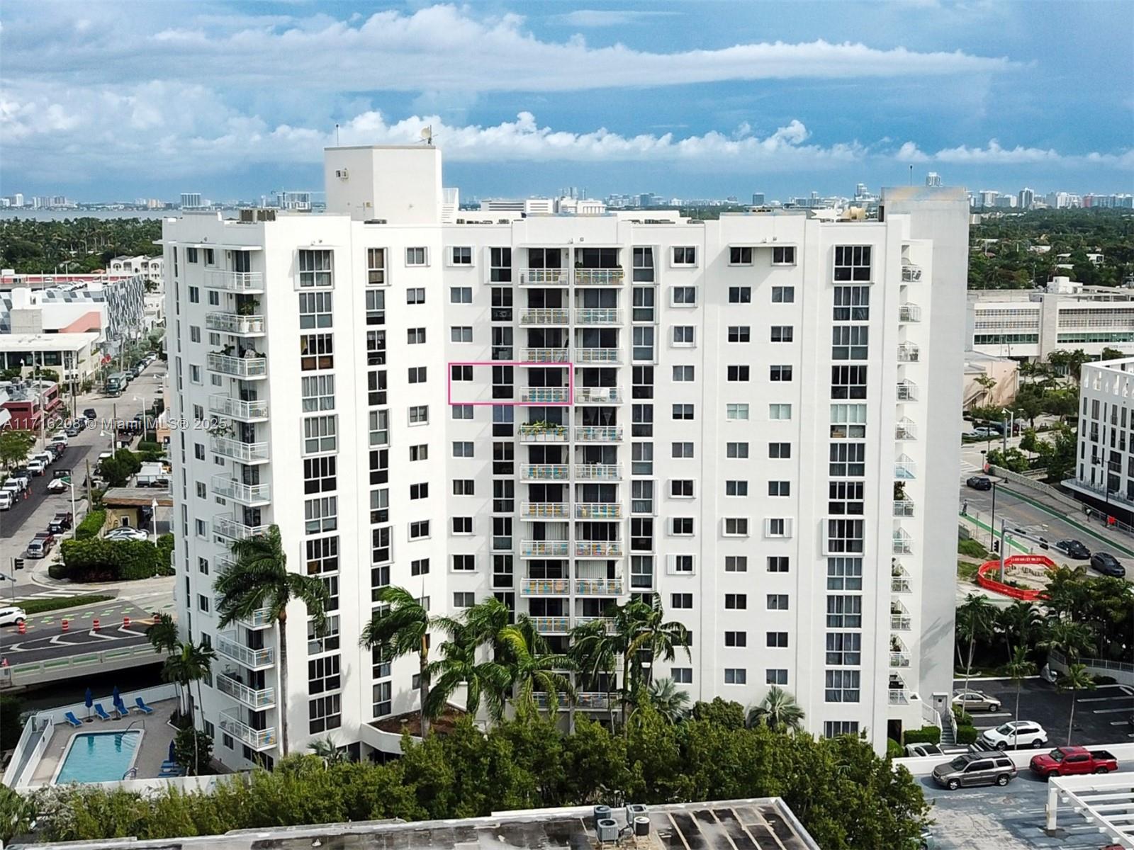 a view of a city with tall buildings