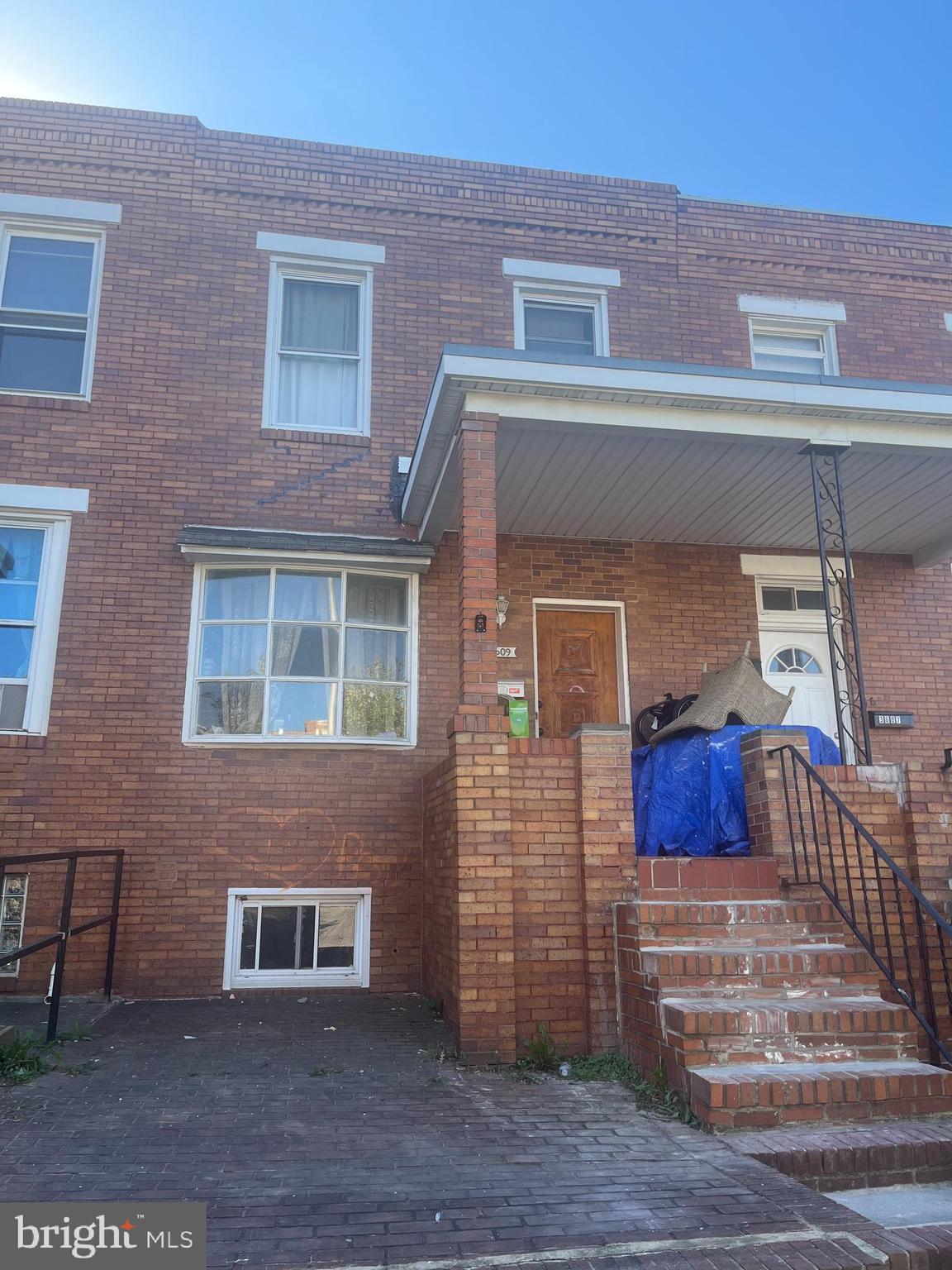 a front view of a house with garage