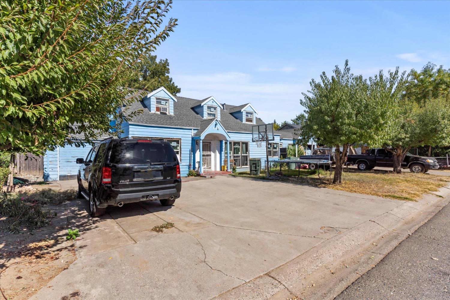 a car parked in front of a house