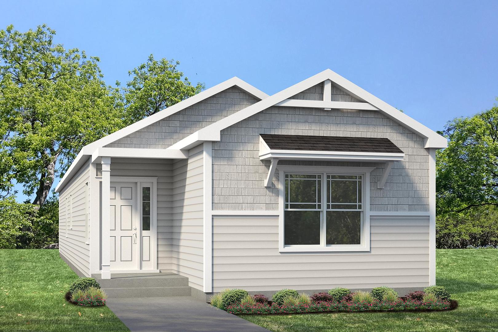 a front view of a house with garage