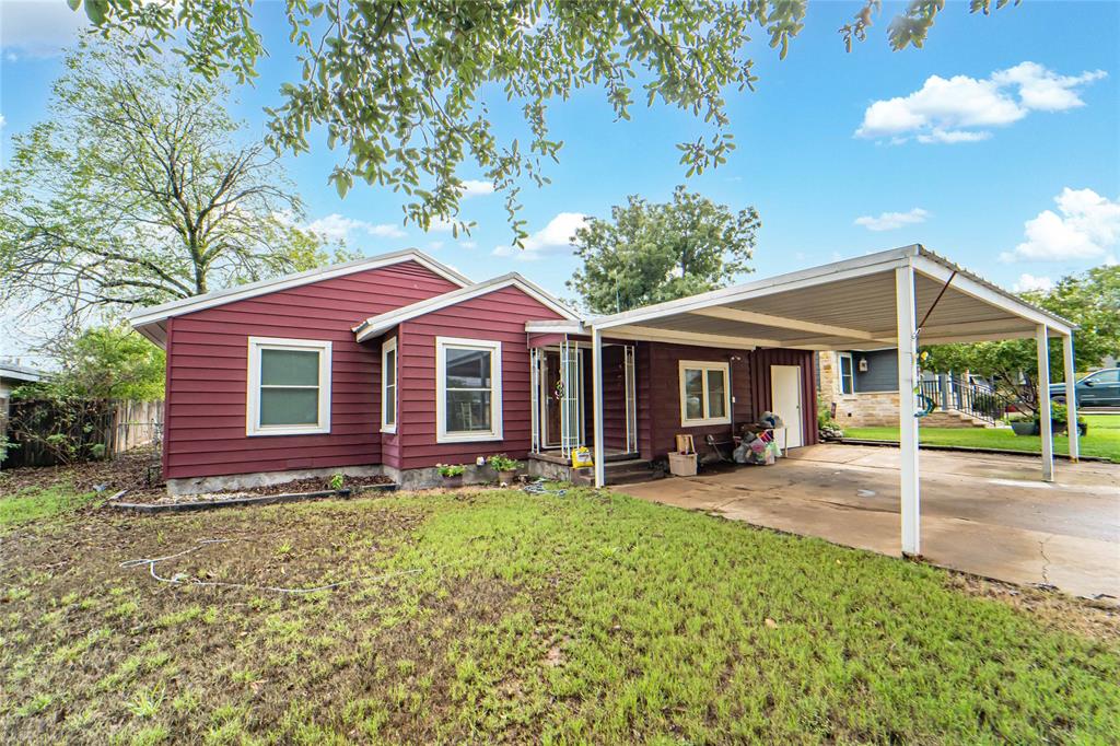 a front view of a house with patio