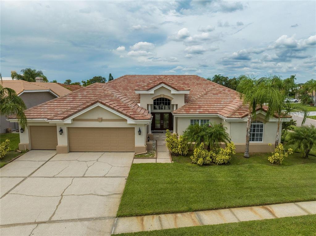 front view of a house with a yard