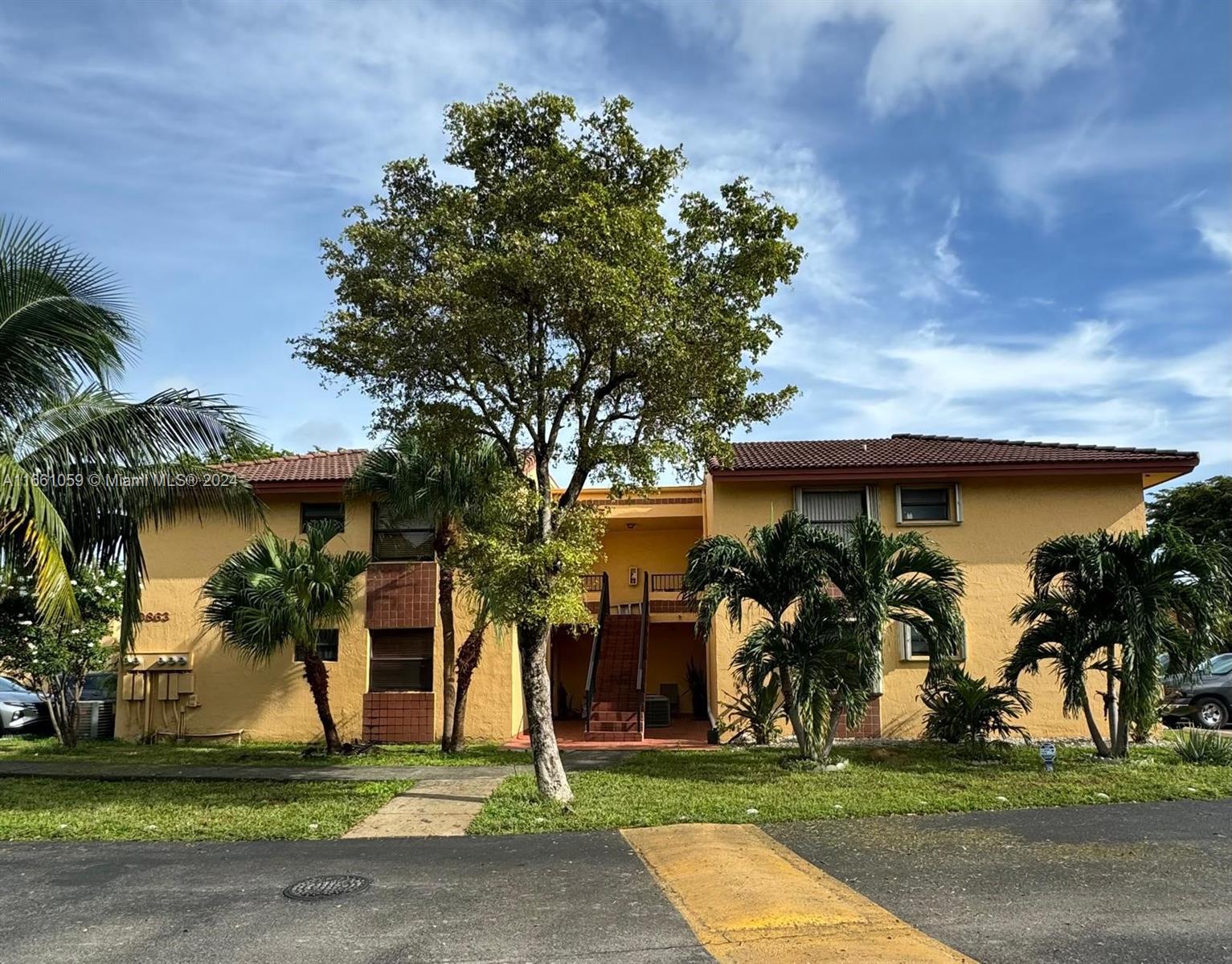 front view of a house with a street