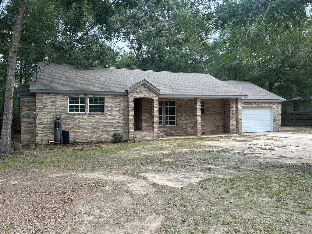 front view of a house and a yard