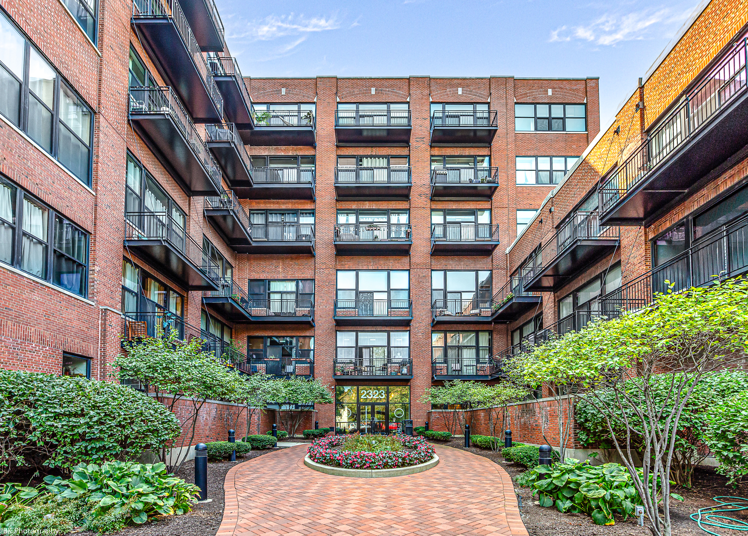 a view of an buildings with a garden