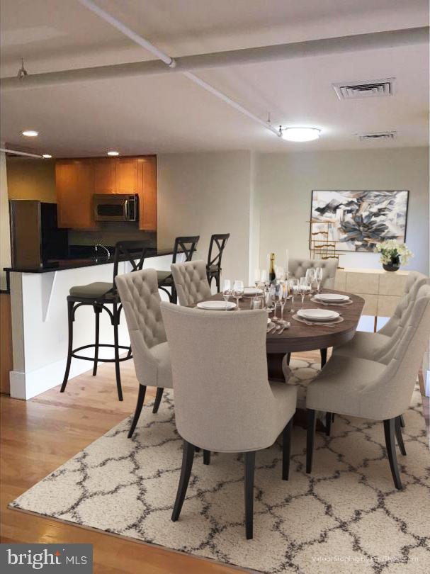 a view of a dining room with furniture