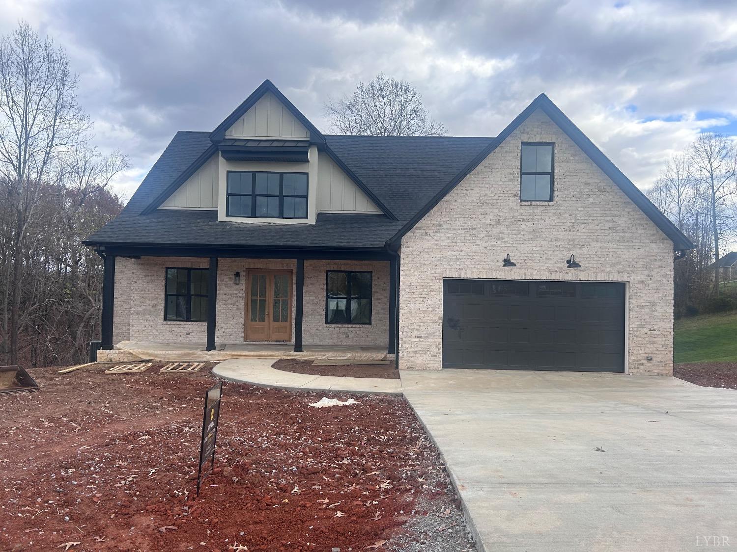 a front view of a house with yard