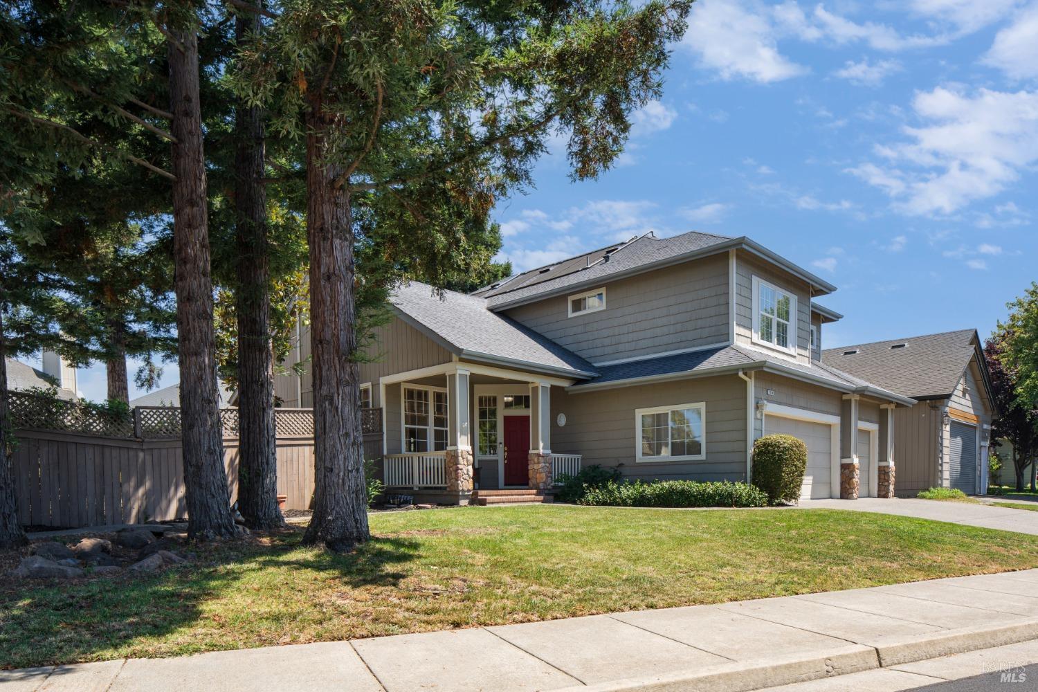 front view of a house and a yard