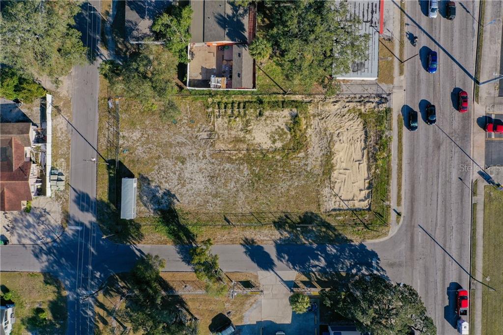 an aerial view of residential house with outdoor space