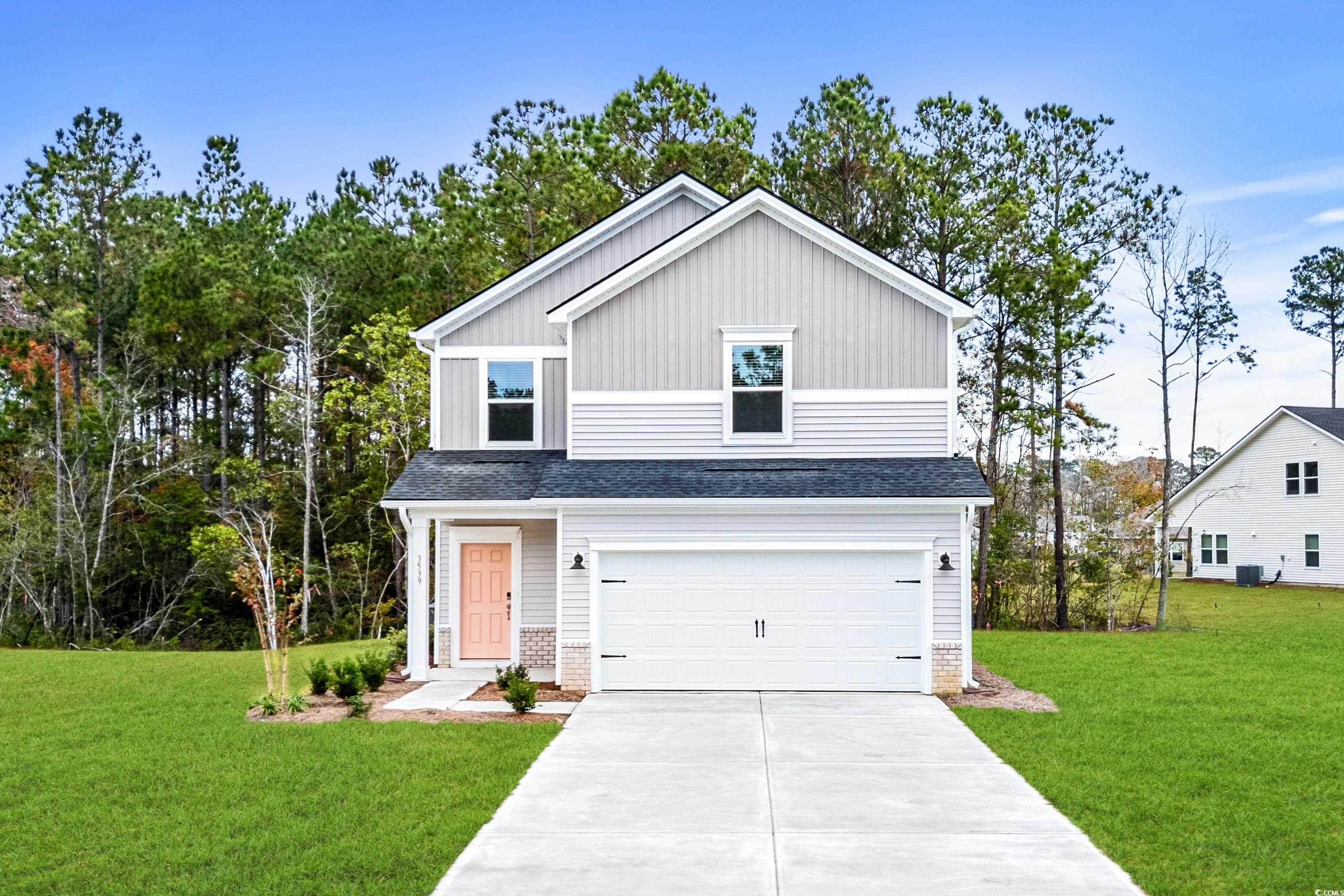 View of front of house featuring a front yard and