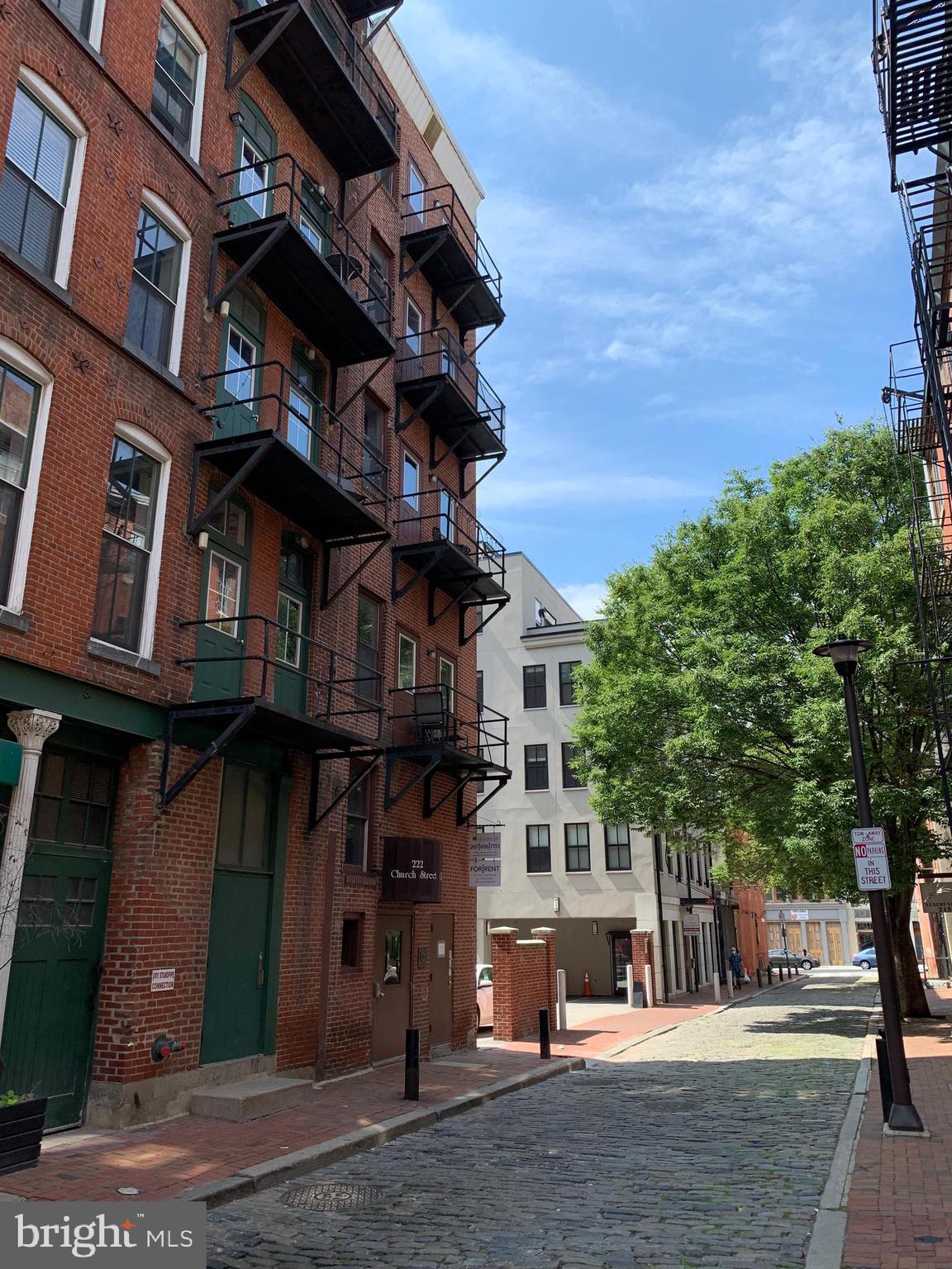 a view of a building with a street