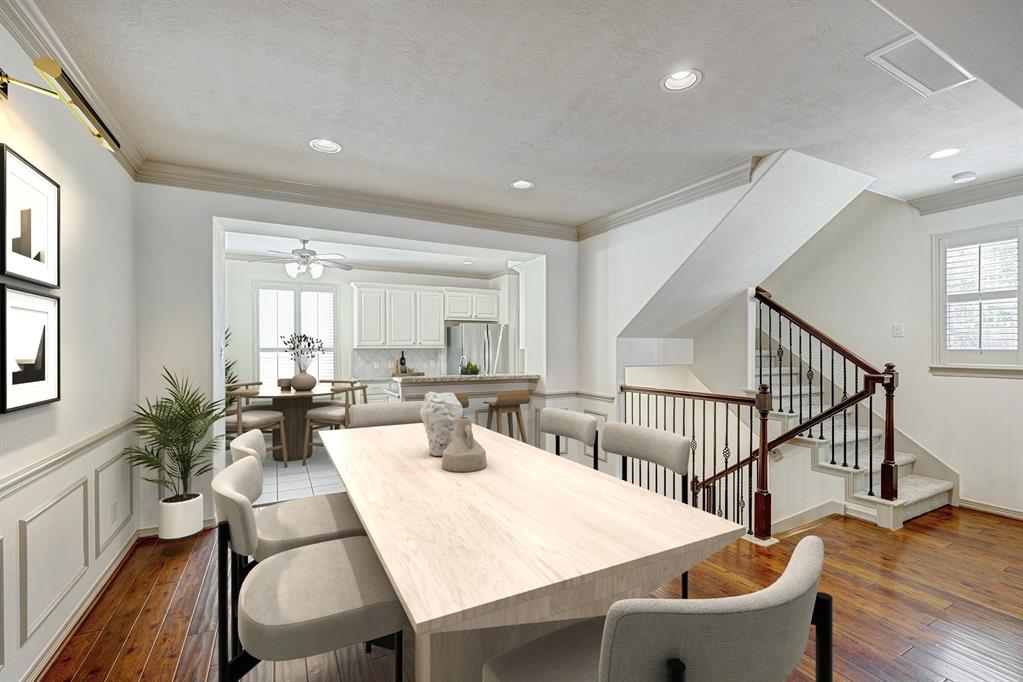 a living room with furniture a wooden floor and a window