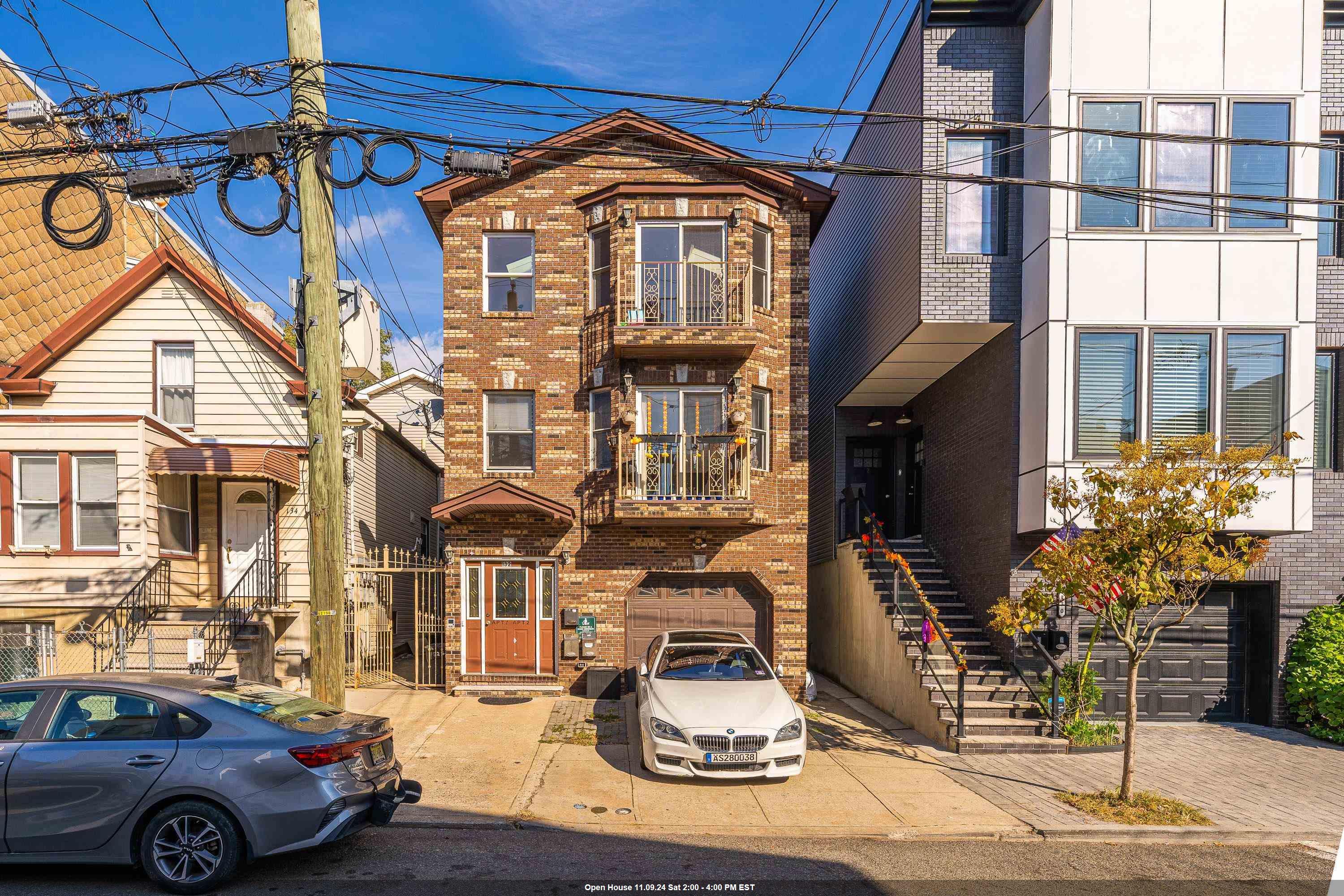 a front view of a building with street view