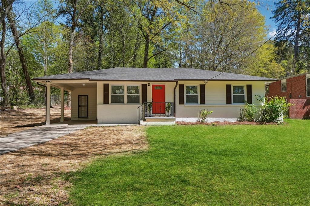 front view of a house with a yard