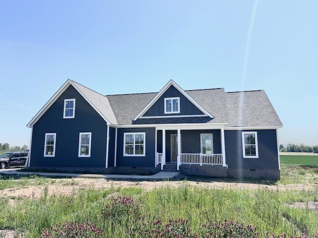 a front view of a house with yard