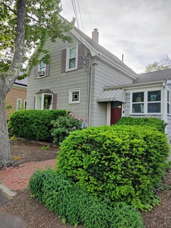 a house view with a garden space