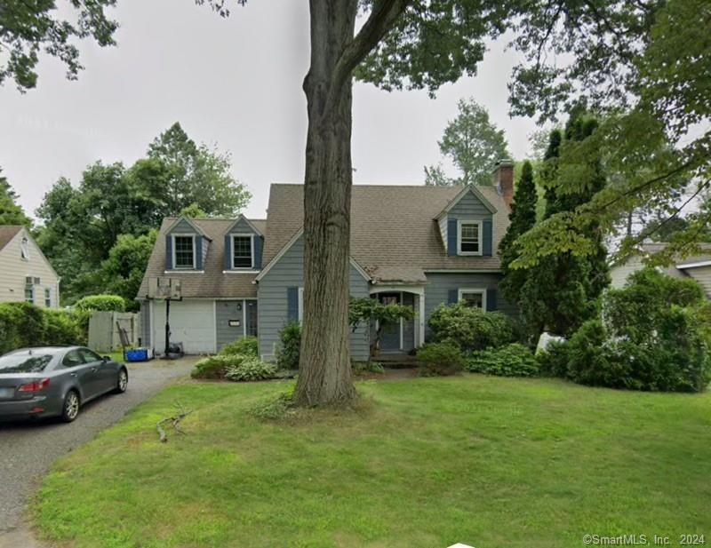 a house view with a garden space