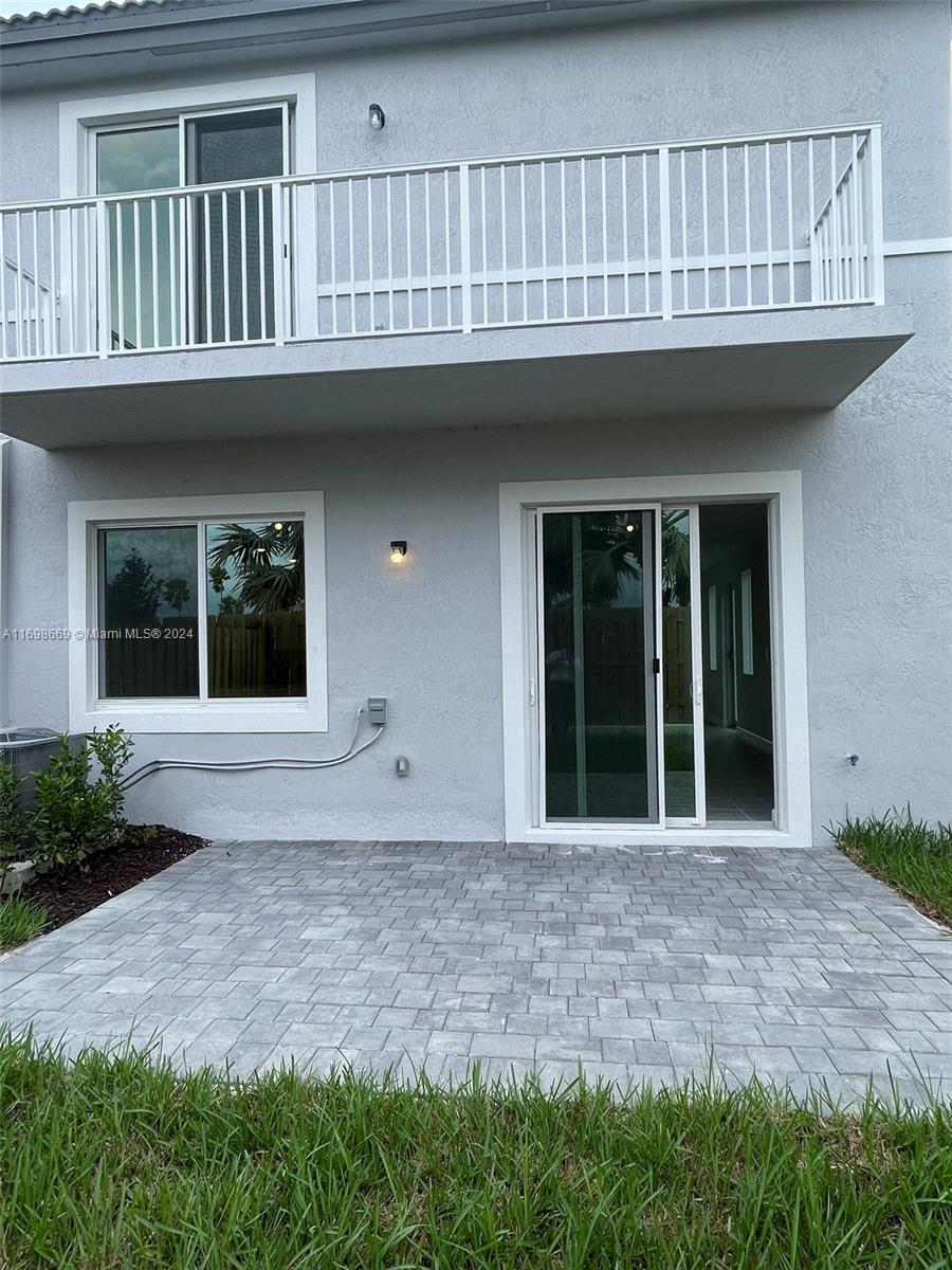 a house view with a garden space