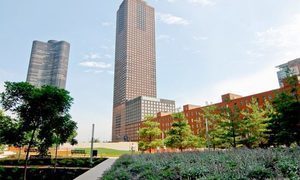 a view of a city with tall buildings