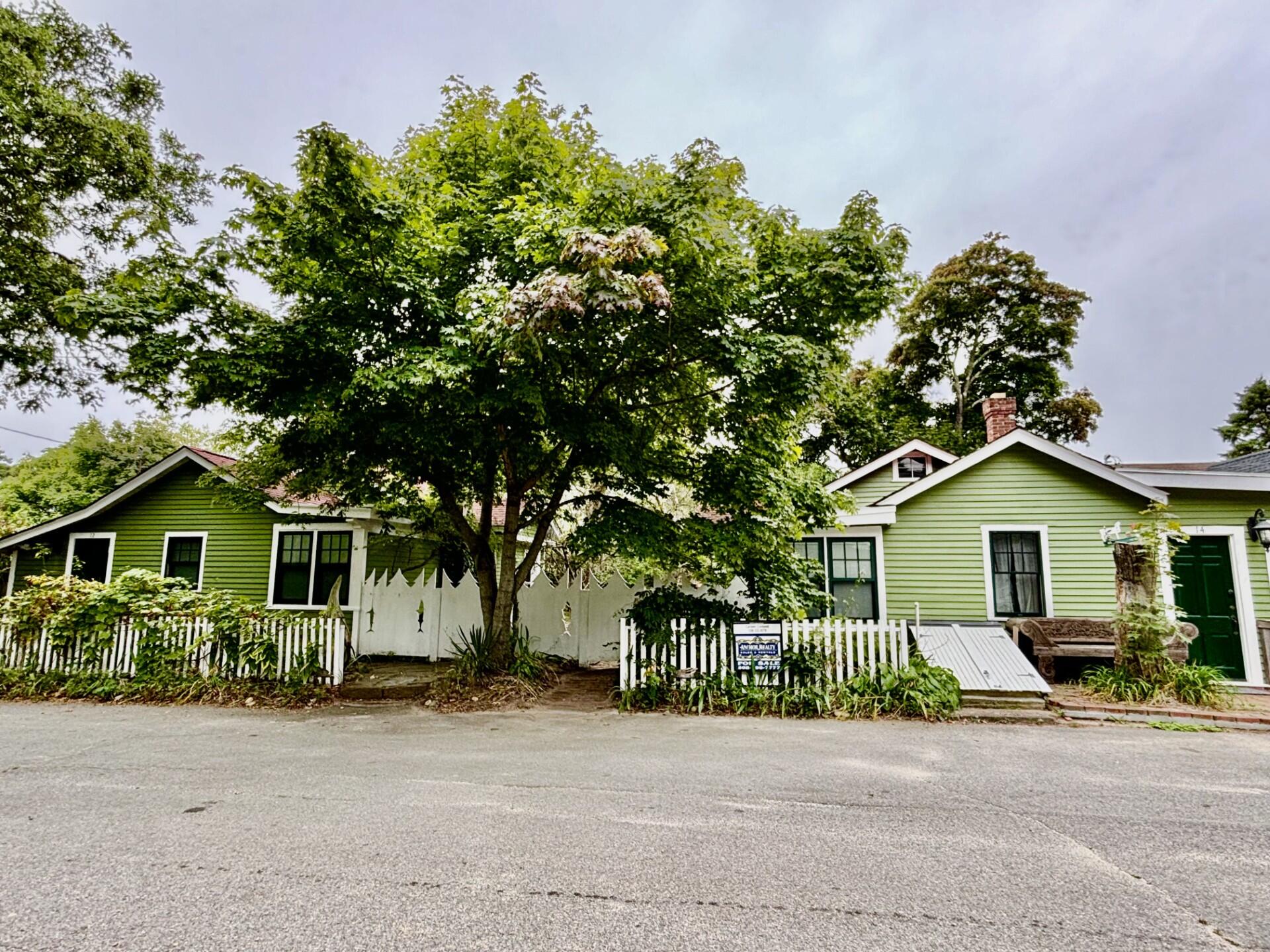 front view of a house with a small yard