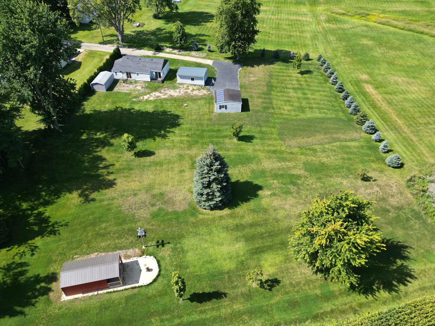 a aerial view of a house with a yard