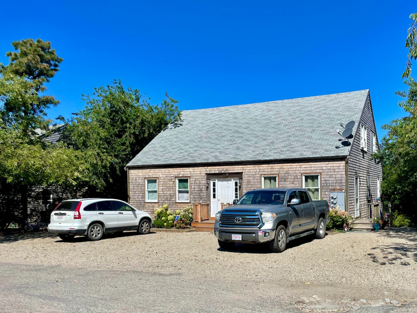 a car parked in front of a house