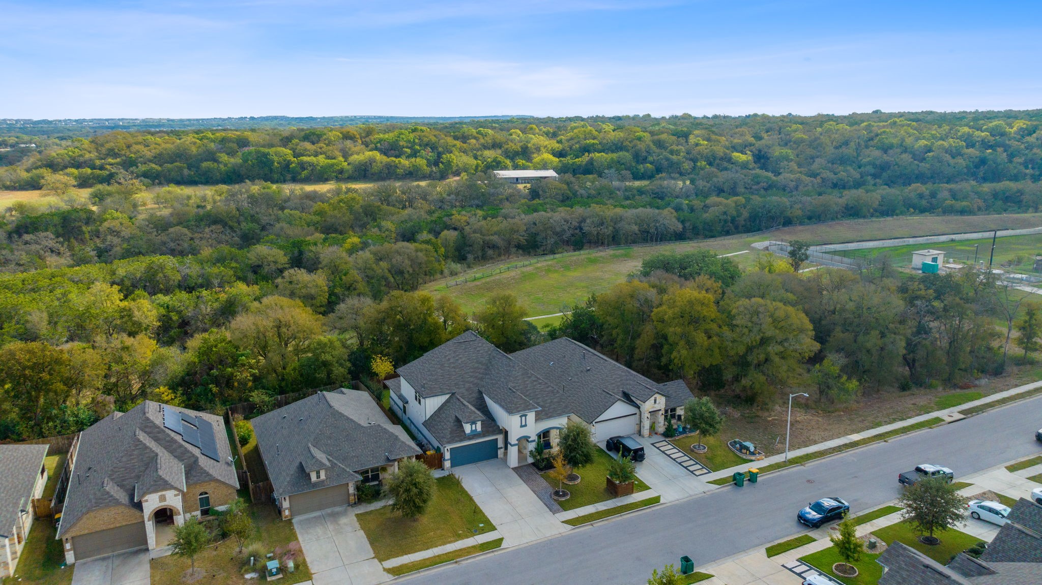 an aerial view of a house with garden space and outdoor space