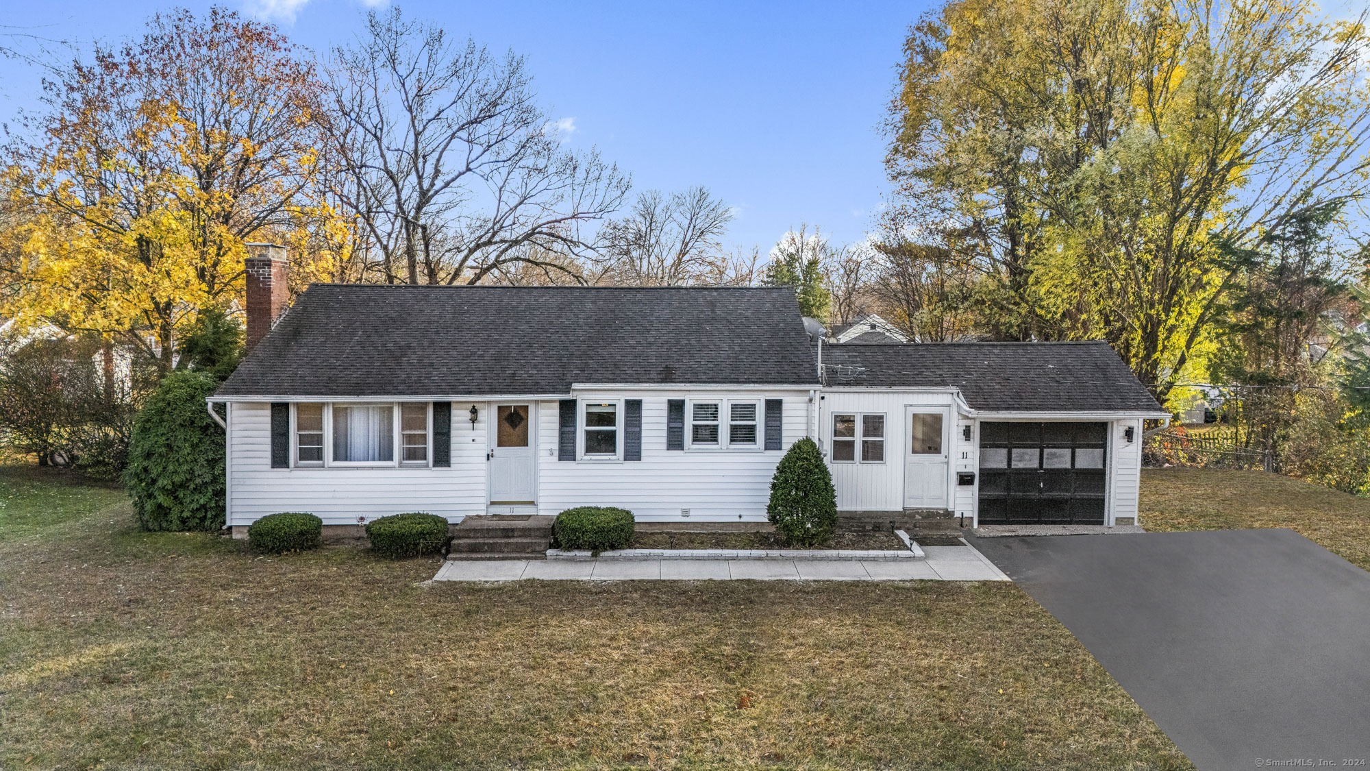 front view of a house with a yard