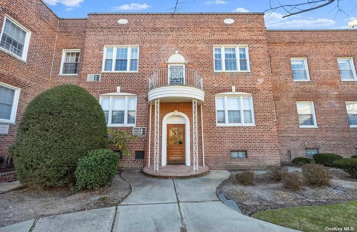 View of front of home with a balcony