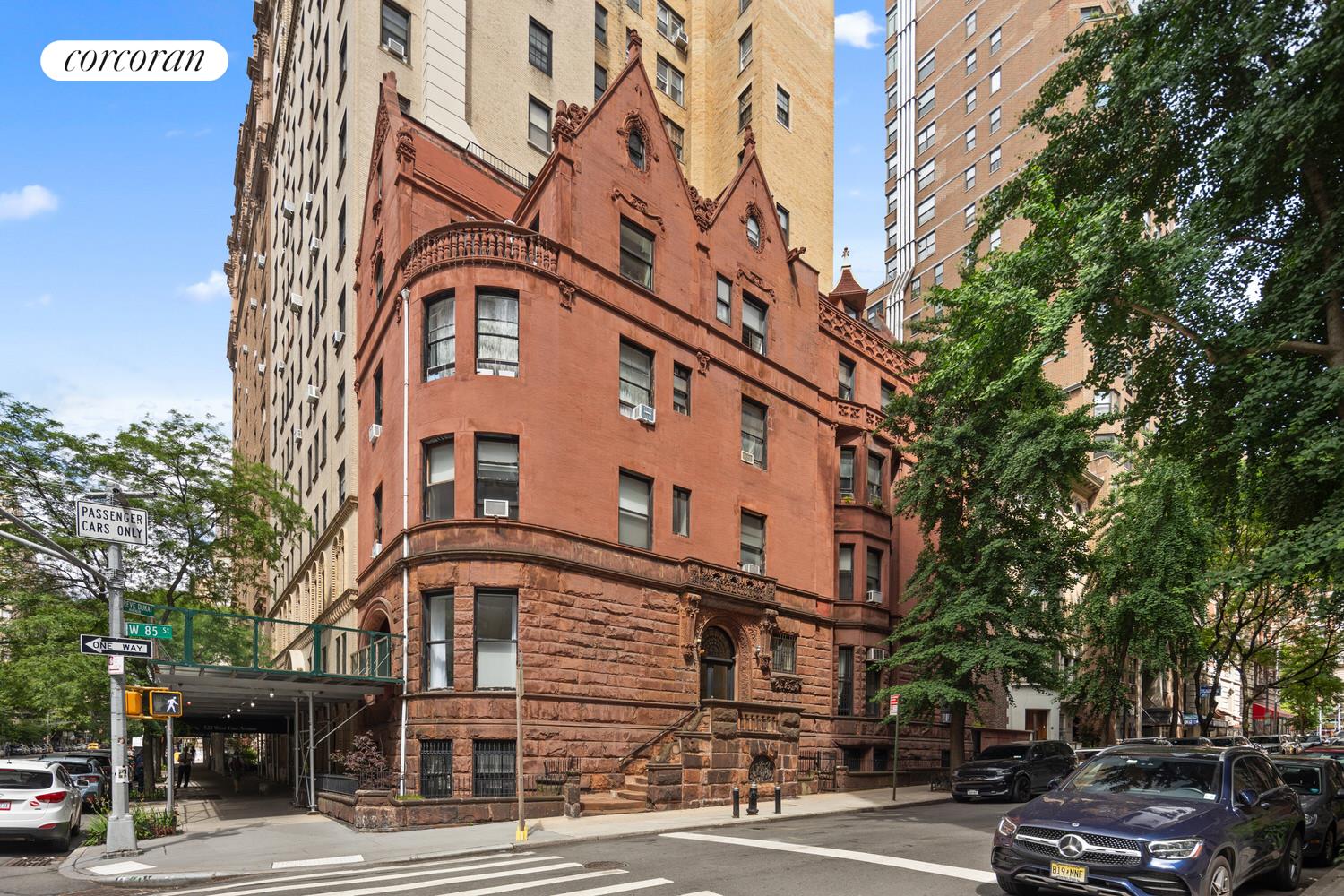 a view of a building with a street