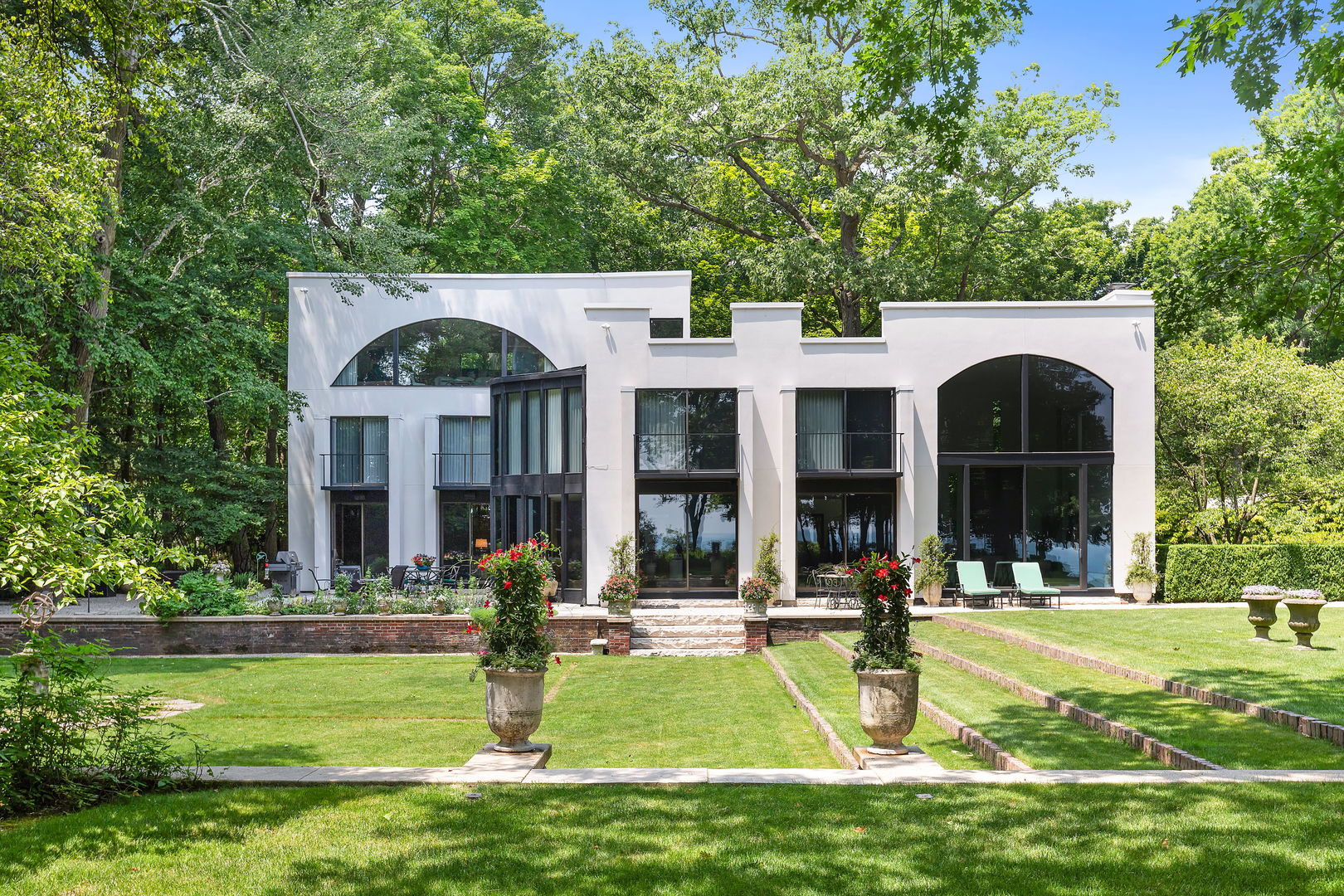 a front view of a house with swimming pool