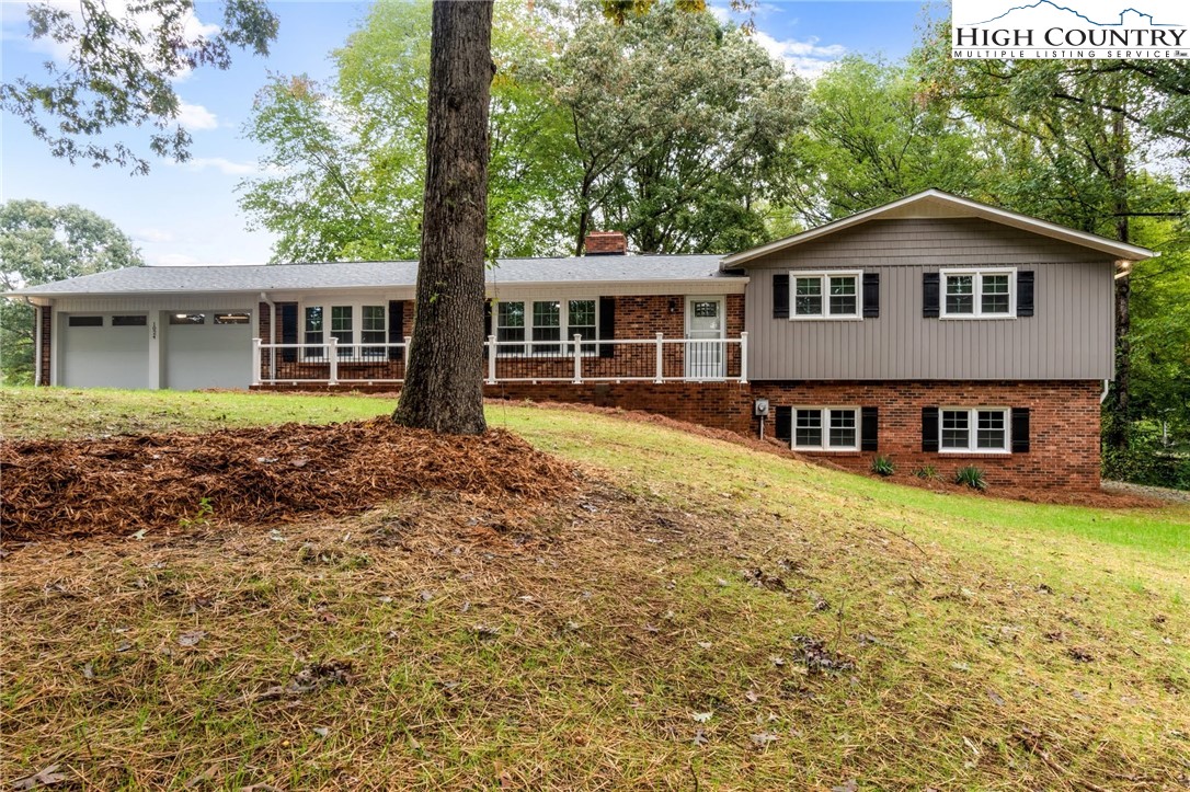 a house view with a garden space