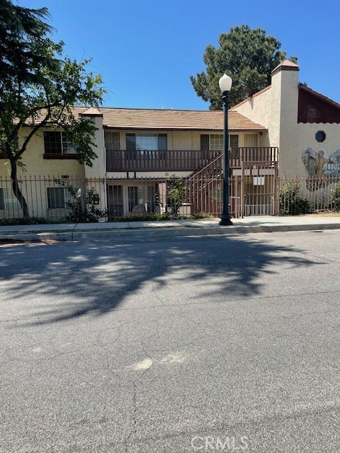 front view of a house with a street