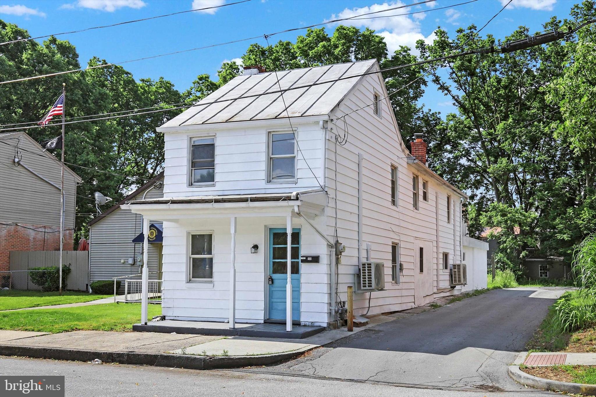 front view of house with a yard